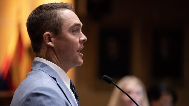Cardinals quarterback Colt McCoy addresses the Senate during the opening session of the 56th Legislature in Phoenix.